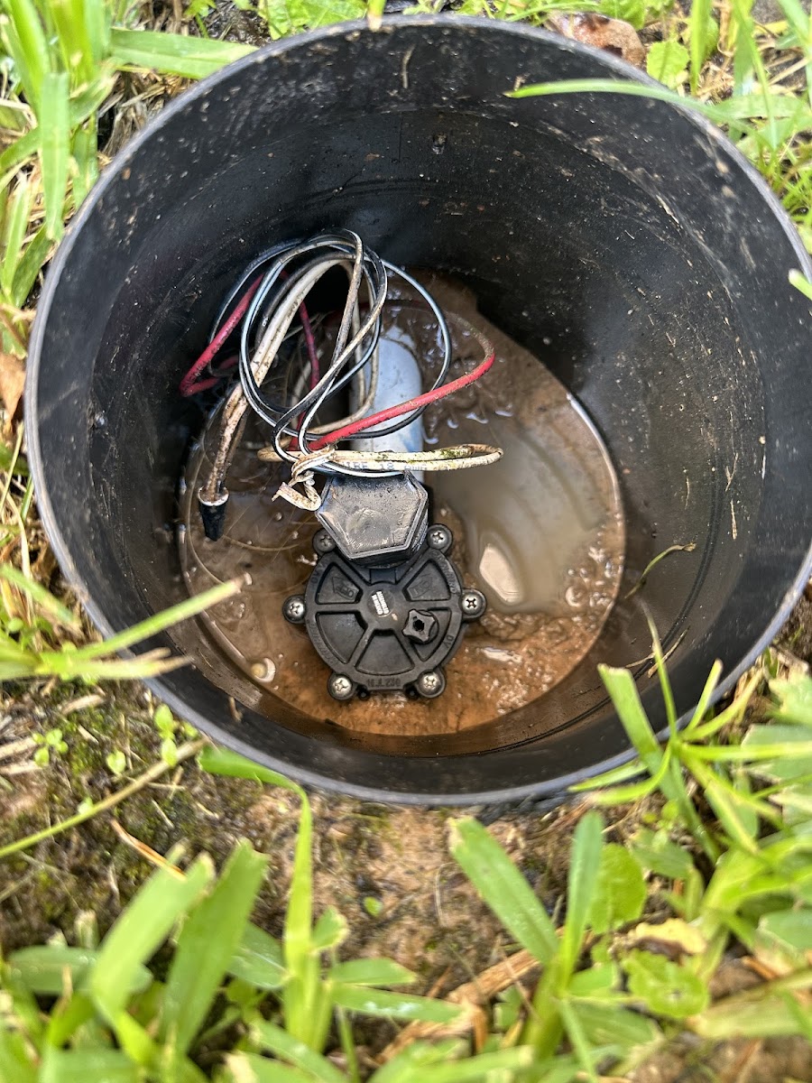 Valve solenoid inside a round in-ground valve box